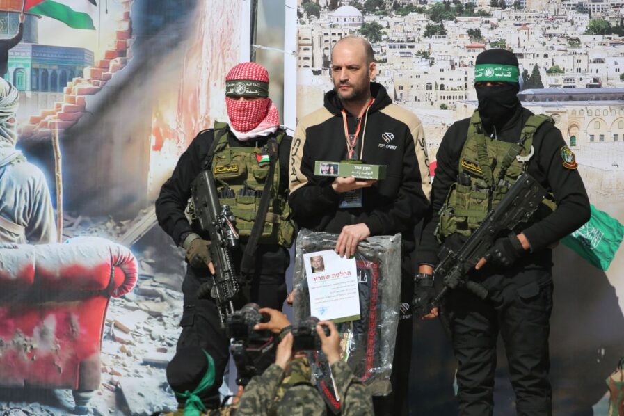 Flanked by gunmen, Israeli hostages face last minute ordeal