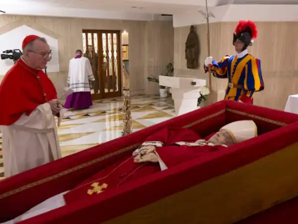 Vatican releases pictures of Pope Francis in open coffin